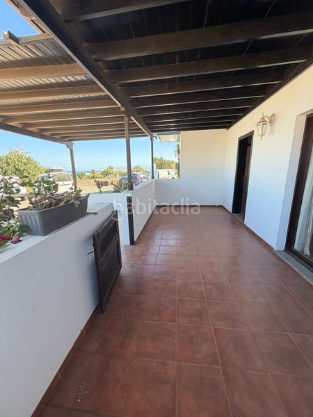 Foto 4a2177e9-7b07-437b-a0de-4d21409ab836. Casa aparellada a costa Teguise Teguise