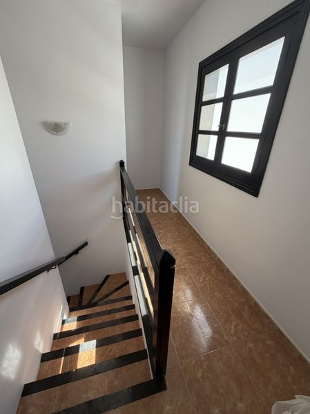Foto f08ca02b-c215-46ef-a88b-6001542b03a2. Casa aparellada a costa Teguise Teguise