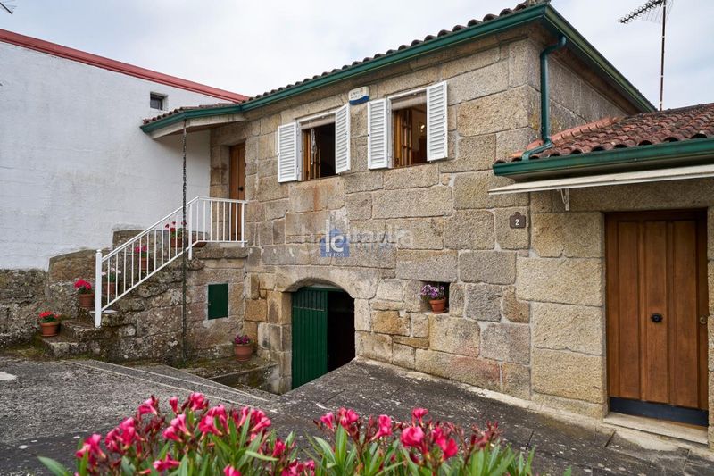 Foto 03d23a82-2540-411d-97df-dff2a4140a44. Casa amb calefacció aparcament a Ventiun Ourense