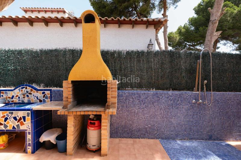 Foto 569ad66a-b992-473e-91bb-25539dcd8415. Chalet  independiente en Punta Prima costa en Orihuela