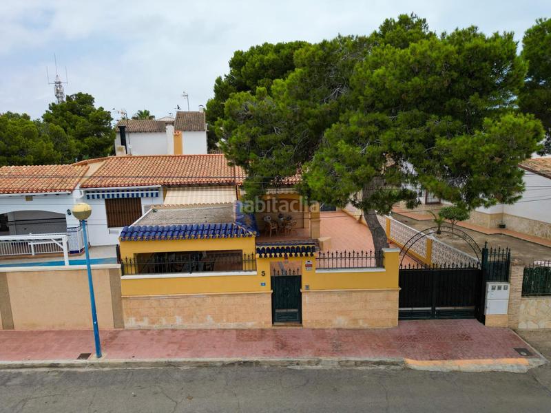 Foto c2c13c2e-1e6e-4fa6-8c26-a953fbf6a06a. Chalet  independiente en Punta Prima costa en Orihuela