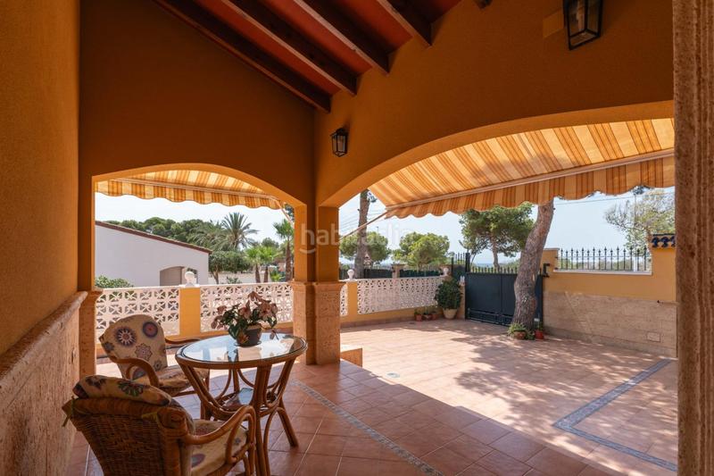 Foto d2e52201-1f8e-4328-915b-7a2b334cb3a2. Chalet  independiente en Punta Prima costa en Orihuela
