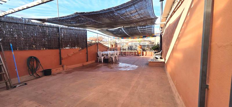 Foto 10b66a27-0f8b-4180-8a57-fa9519c87455. Casa adossada amb xemeneia calefacció aparcament a Terrassa