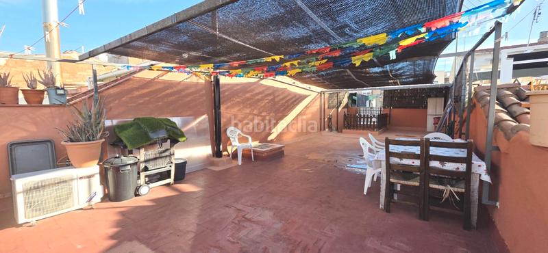 Foto 1c8f6d95-c93b-43e9-83f1-b003428ed2b9. Casa adossada amb xemeneia calefacció aparcament a Terrassa