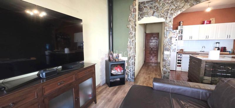 Foto 5a0d5ff4-6bfd-46ae-8c6a-1b2dc4f03d25. Casa adossada amb xemeneia calefacció aparcament a Terrassa