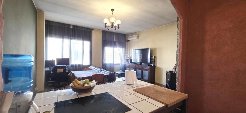 Foto 5eb01e85-6997-49ad-8ba6-0ddc078191d6. Casa adossada amb xemeneia calefacció aparcament a Terrassa