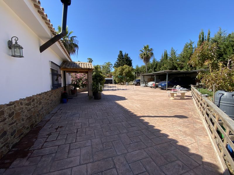 Foto 6d6fe040-6e57-49b1-bac9-d14fa1084786. Masia amb aparcament piscina a Los Llanos Estepona