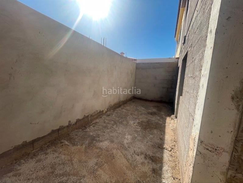 Foto 6ac6ce72-8b77-41ae-a916-060de1a3649b. Casa pareada vecindario. chalet pareado en venta, en zona residencial. para terminar. en Santa Lucía de Tirajana