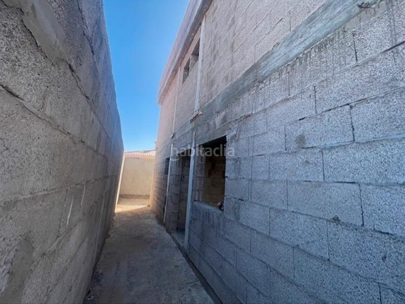 Foto a276d7fe-f31f-4893-861f-d1a78b2e5532. Casa pareada vecindario. chalet pareado en venta, en zona residencial. para terminar. en Santa Lucía de Tirajana