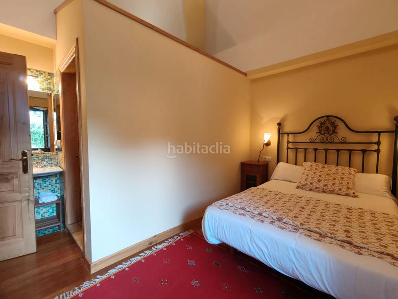 Foto 25494e8c-cf95-468c-bf9d-2289e5d4e77a. Casa amb xemeneia calefacció a Quirós