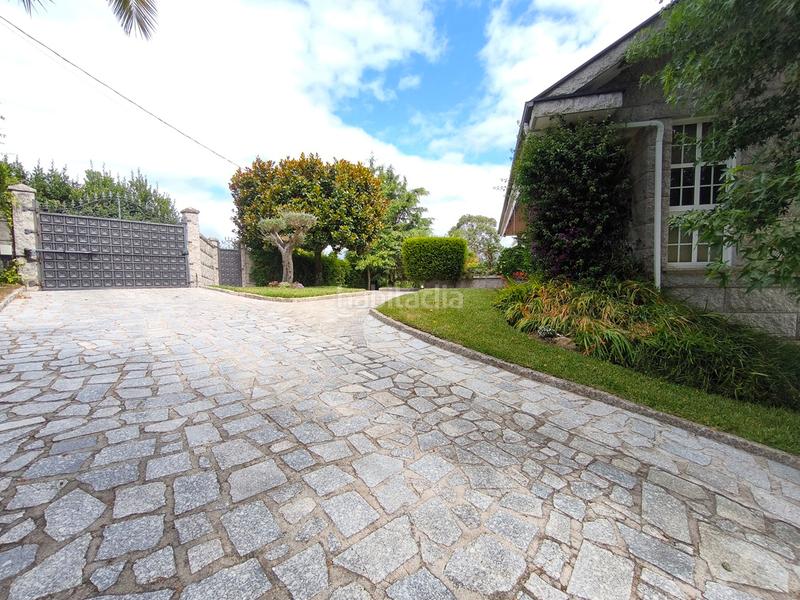 Foto e09d0a6f-a8c8-4245-93df-fe9be7214339. Chalet con camino riscaldamento piscina in Fontecarmoa Vilagarcía de Arousa