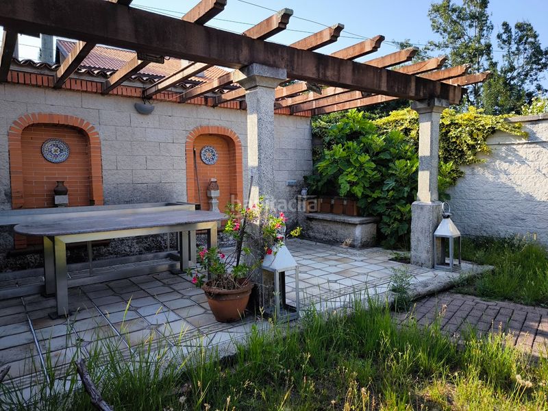 Foto 07d79893-313f-40b8-88d2-be079427c470. Casa amb calefacció aparcament a Rubiáns Vilagarcía de Arousa