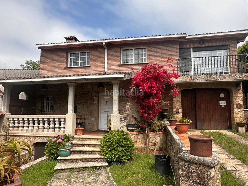 Foto 62845a4e-adce-48c1-9b3c-f7e02f25e250. Casa amb calefacció aparcament a Rubiáns Vilagarcía de Arousa