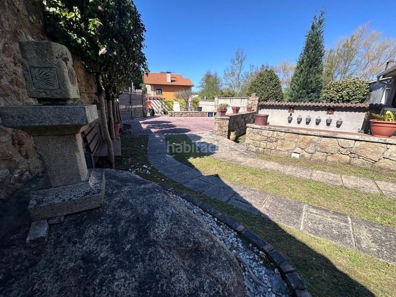Foto c49223b4-80d2-4576-85c6-7ce88ce511ee. Casa amb calefacció aparcament a Rubiáns Vilagarcía de Arousa
