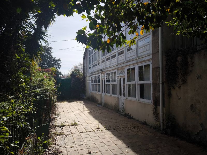 Foto 872e3ff8-8db4-4ddd-b2cd-944b0d4eb514. Casa amb xemeneia calefacció aparcament a Cornazo Vilagarcía de Arousa