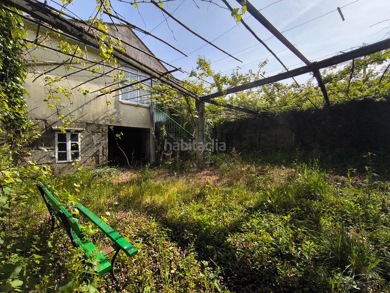 Foto b8c486df-443e-4276-b0c6-17f60142d46e. Casa amb xemeneia calefacció aparcament a Cornazo Vilagarcía de Arousa