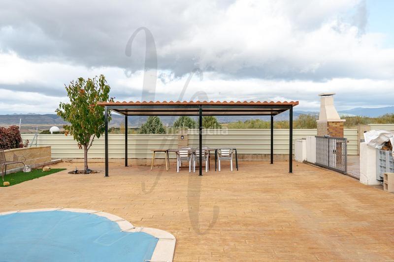 Foto 886af135-780e-4480-a516-482f67edfd39. Casa aparellada amb calefacció aparcament piscina a Uceda