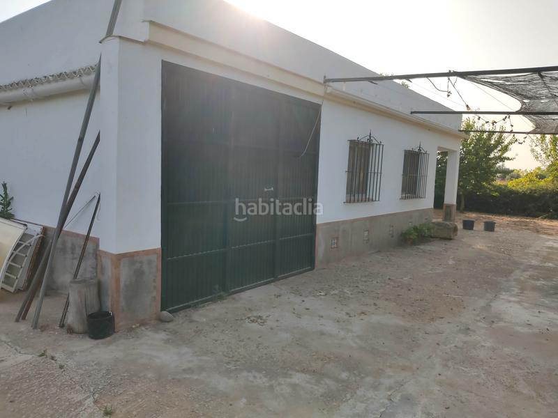 Foto deeabe6a-783a-4cd5-a076-231fc2cb86cb. Finca rústica vendo finca rústica con chalet próximo a en Utrera