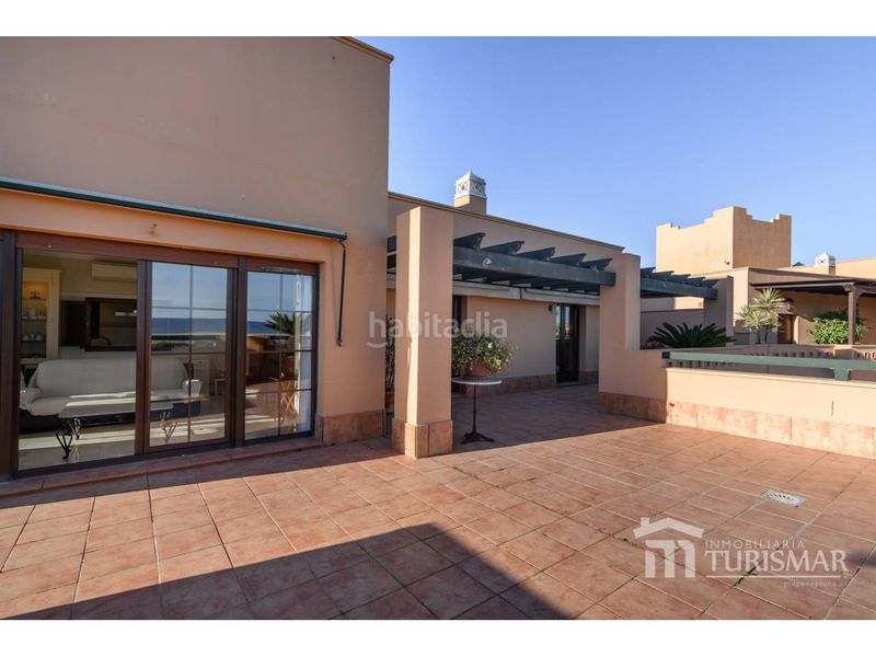 Foto 4e67104a-3407-4b43-863c-1424605bd48b. Apartament amb aparcament piscina a Isla Canela Ayamonte