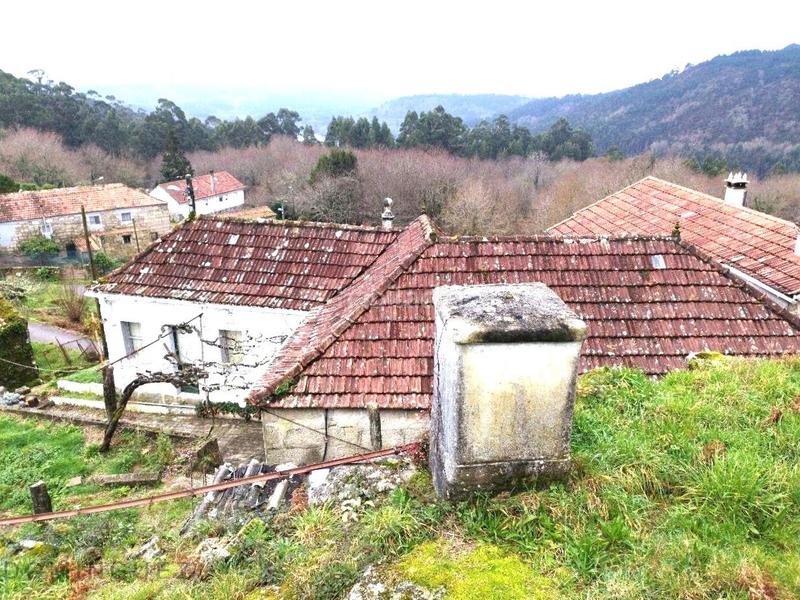 Foto b8bf9cb7-bc7c-4bee-ab33-4e6402df5a43. Maison avec parking dans Ponte - Caldelas