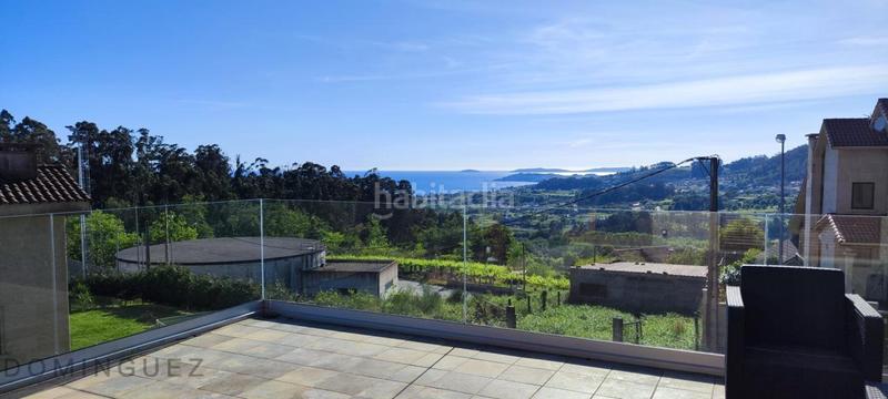 Foto a882b6ac-d1b9-4a53-8c74-88fc1efd6df6. Casa amb calefacció aparcament piscina a Dorrón Sanxenxo