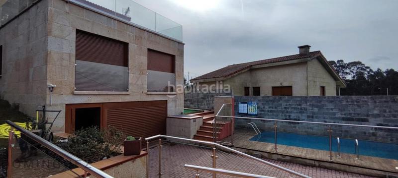 Foto b36d369a-5ba4-49d7-89e9-df5a0bd8e686. Casa amb calefacció aparcament piscina a Dorrón Sanxenxo