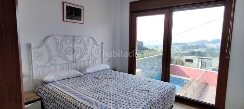 Foto c3c430fd-c703-496b-abe1-e6623eb3bcea. Casa amb calefacció aparcament piscina a Dorrón Sanxenxo