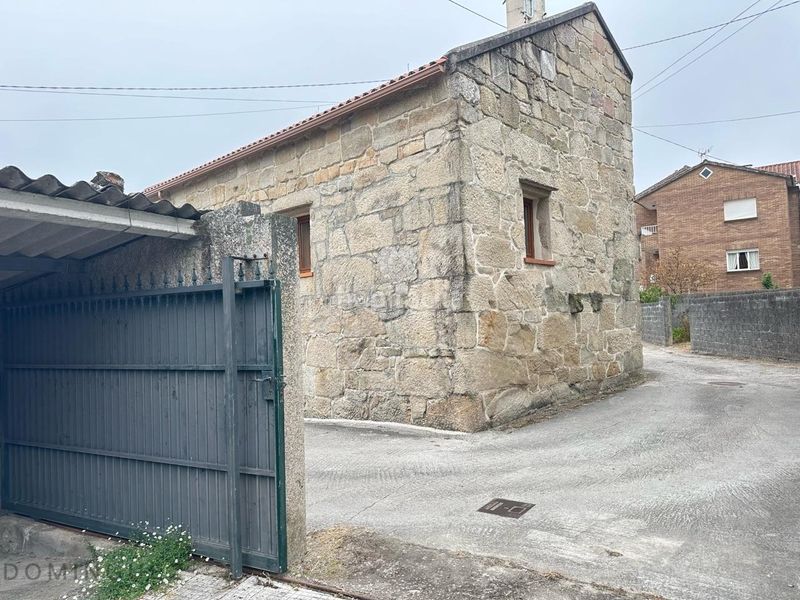 Foto 5d350eb7-7fff-41c6-9fe9-43fa9ecfee68. Casa amb aparcament a Marín
