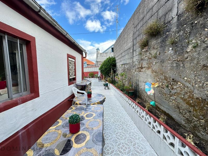 Foto bc2869d3-17c4-4aa9-ae5b-e1d82c39514c. Casa amb aparcament a Lavadores Vigo