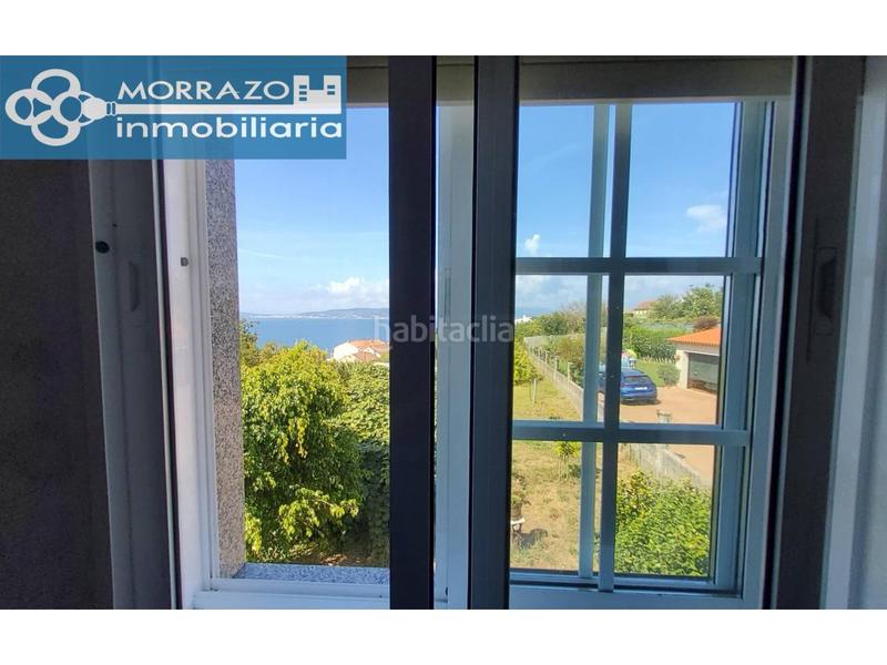 Foto 5077dfd9-c4bc-4dce-9831-71651d04d6f0. Casa en lugar means 54 casa con terreno y vistas cerca de la playa en Bueu