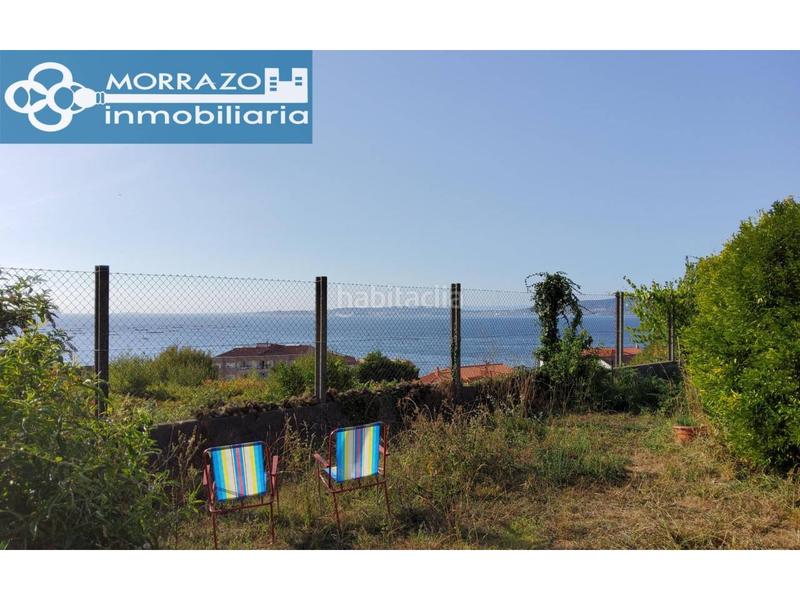 Foto 6949a692-d5f0-441a-8d7d-51fa2cc46de3. Casa en lugar means 54 casa con terreno y vistas cerca de la playa en Bueu