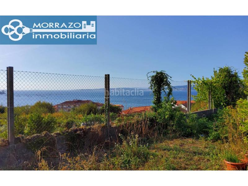 Foto 7f6c6602-c96d-4bb4-998b-80875296e67f. Casa en lugar means 54 casa con terreno y vistas cerca de la playa en Bueu