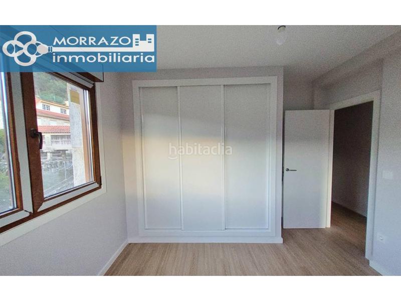 Foto 7d9e0e52-d4ae-4dc5-9ff2-d94c0c4f74a0. Casa bifamiliare con riscaldamento parcheggio in Moaña