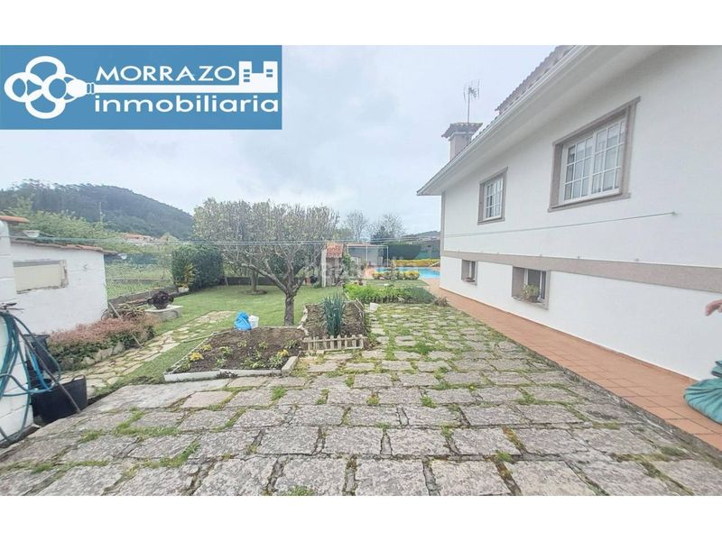 Foto e8bc9c8a-bf47-4ae3-b2bb-ecd38f0c4cb1. Casa amb calefacció aparcament a Marín