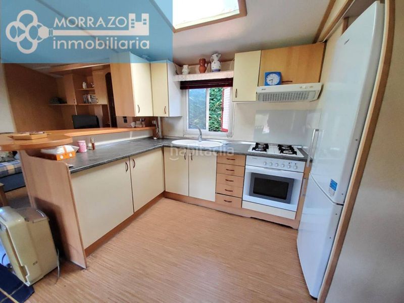 Foto f3eb9022-ace6-42d9-a724-31fcd27e44c5. Casa amb calefacció aparcament a Bueu