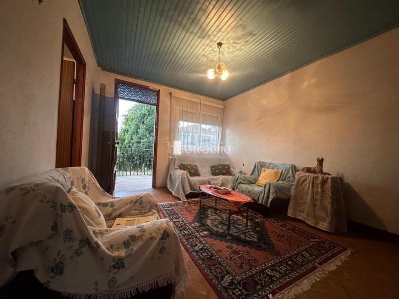 Foto f6cc7634-bcbd-4453-899b-bea8cc792711. House with parking in Castrelo de Miño