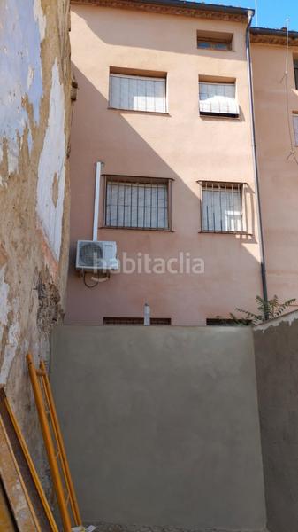 Foto 3c2eaeed-63dd-40f7-b7fa-1ec7062d7584. Casa pareada casa de pueblo con dos escaleras 300m2 en Castielfabib