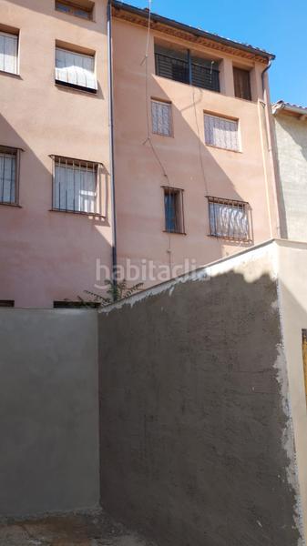 Foto e60d70fa-6fa0-4dc1-947d-5148715fa343. Casa pareada casa de pueblo con dos escaleras 300m2 en Castielfabib