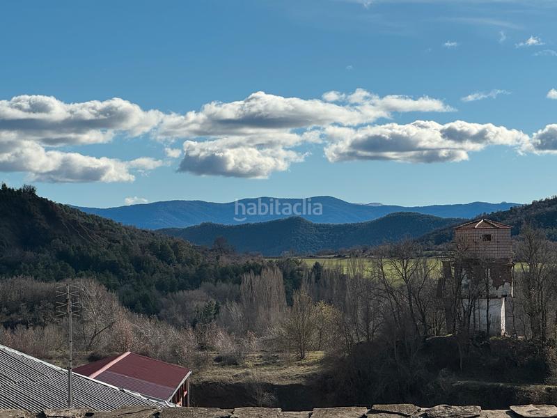 Foto b7ee3389-6c86-4157-8fbe-5d325b78e5dc. Masia amb xemeneia aparcament a Poblaciones Sur Jaca