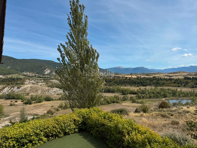 Foto f22d0e7a-cd69-4ab6-8001-50737af3724d. Semi detached house with fireplace heating parking pool in Jaca