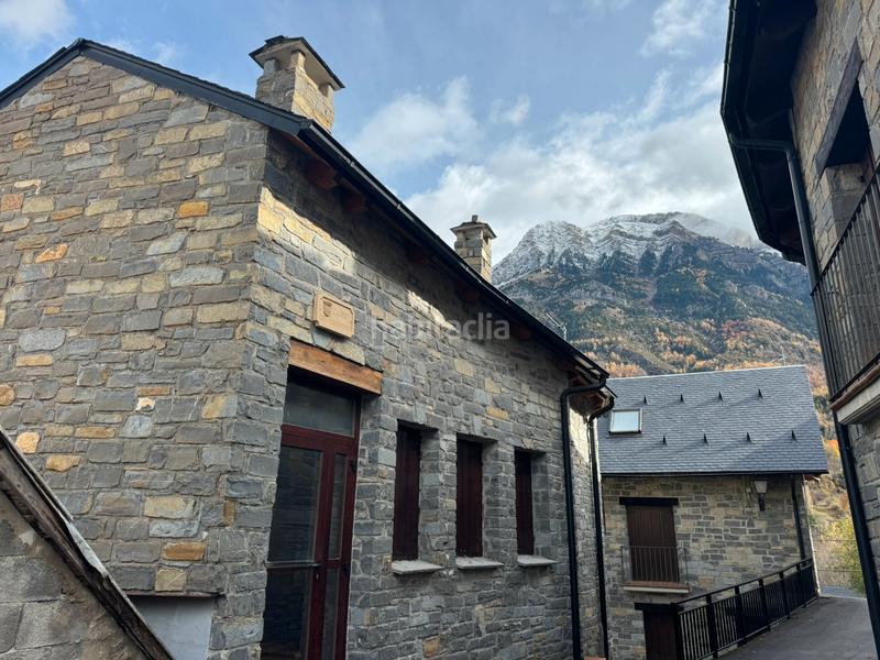 Foto c65a8bcc-d50f-4caa-88f7-863853510dc2. Maison jumelée avec cheminée chauffage parking dans Hoz de Jaca