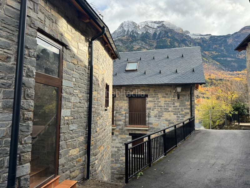 Foto f047b278-5f2b-490e-97fd-7d564fb4018d. Maison jumelée avec cheminée chauffage parking dans Hoz de Jaca