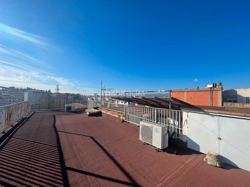 Foto 9b6e08e7-ef74-458e-8faa-a43fe89142f2. Àtic amb xemeneia calefacció a Eixample Nord Girona