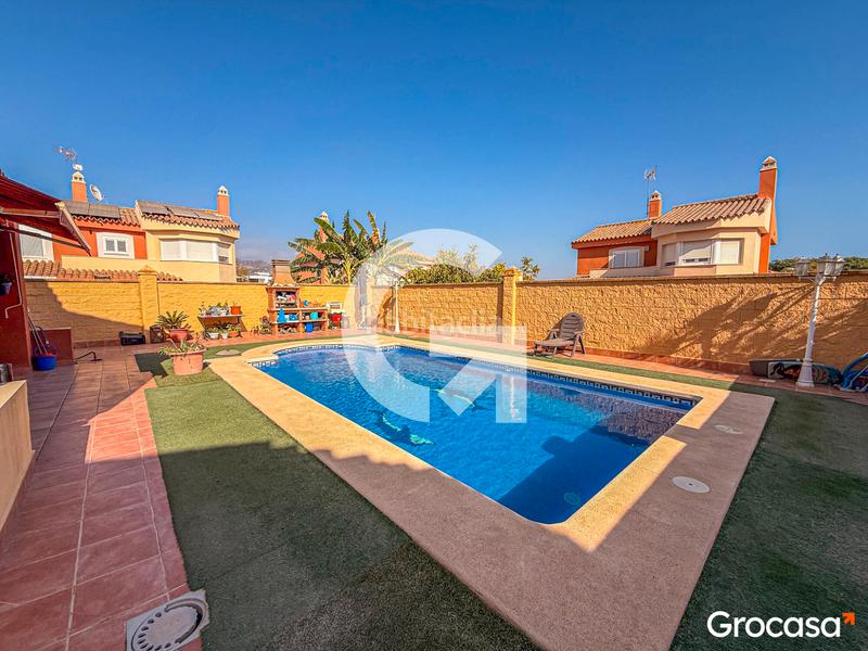 Foto 1b6f4f32-f11d-4255-a611-7d15a8b84523. Casa con parcheggio piscina in El Tomillar Torre del Mar