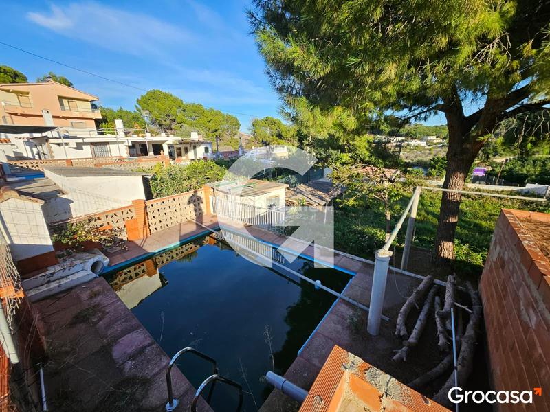 Foto 8cc8d662-2bed-44a2-8b2c-e4825dd5ded4. Chalet avec parking piscine dans Centro-El Castillo Sagunt