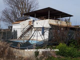 Finca rústica a Caspe. Finca de regadío en caspe. casa 52m2 + terreno de 1.906m2. con p