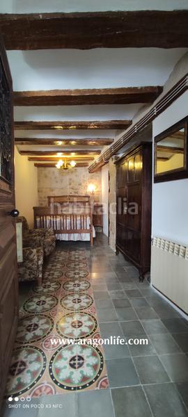 Foto f10b6f7a-8fe5-40c7-b37c-8a4ec59afc6c. Gebäude in calle mayor 13 in Lledó