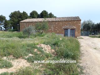Masia  Calle monjas. Finca de regadío de 11.926m2 + casa de 257m2. caspe. 40.000€