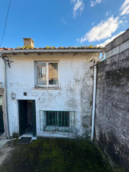 Foto a3323bb5-3e55-48e0-814d-b6e2689306d5. Casa adossada a Conxo Santiago de Compostela