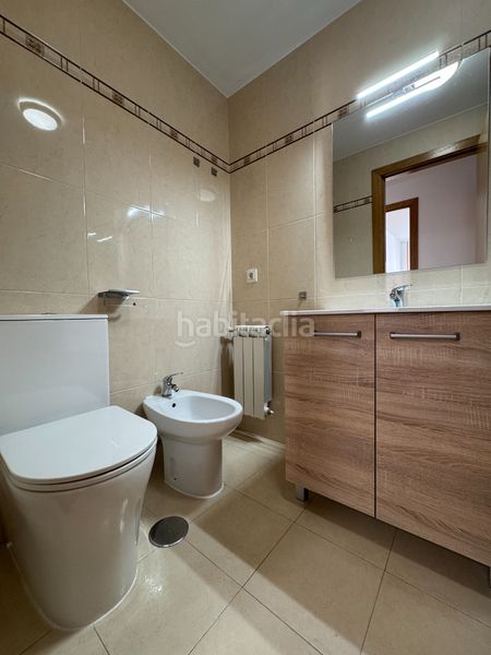 Foto 0a7573ac-a583-4bbe-879f-a06068a24e4b. Lloguer pis amb calefacció aparcament a O Milladoiro Ames
